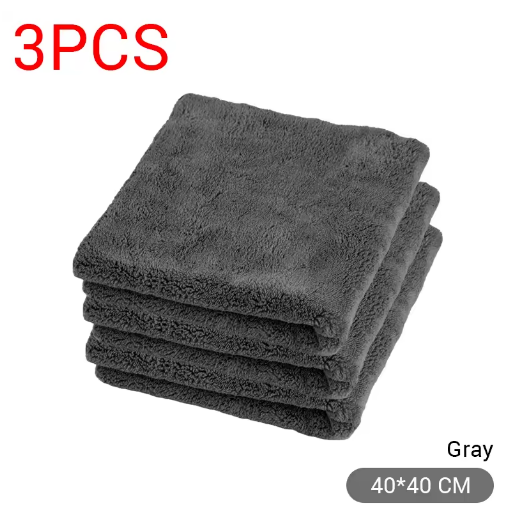 Stack of gray towels with '3PCS' and size '40*40 CM' on a white background